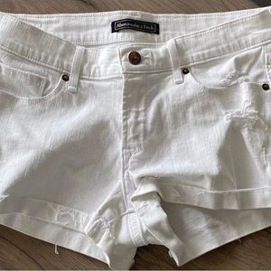 Abercrombie & Fitch distressed white shorts.